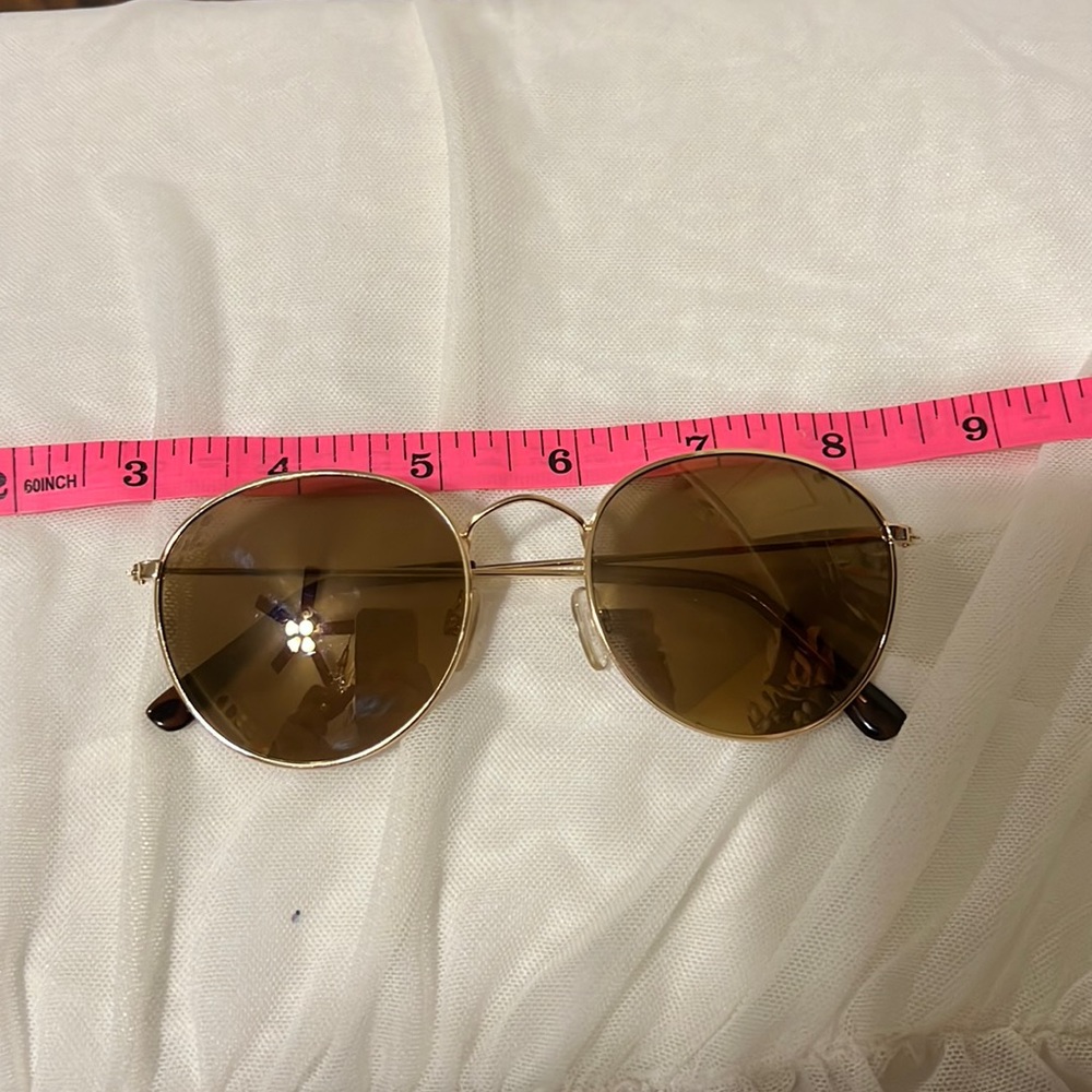 Brown and gold sunglasses